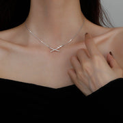 X-shaped diamond crossed necklace Ecstatic